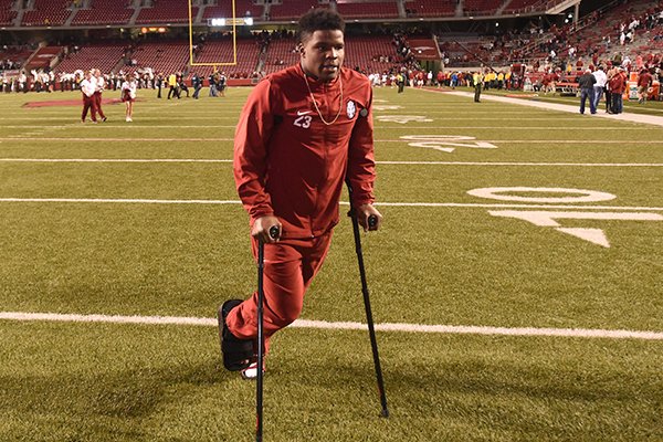 Arkansas linebacker Dre Greenlaw leaves the field following a loss to Alabama on Saturday, Oct. 8, 2016, in Fayetteville. 