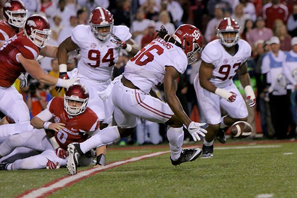 Alabama linebacker Tim Williams recovers a fumble during a game against Arkansas on Saturday, Oct. 8, 2016, in Fayetteville. Williams returned the fumble 23 yards for a touchdown. 