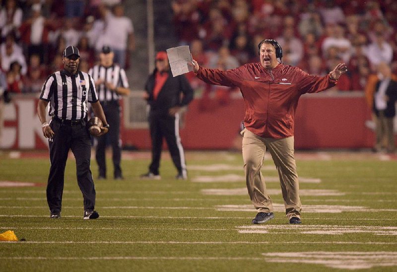 NWA Democrat-Gazette/BEN GOFF @NWABENGOFF
Bret Bielema, Arkansas head coach, has words with the officials in the second quarter against Alabama on Saturday Oct. 8, 2016 during the game at Razorback Stadium in Fayetteville. 