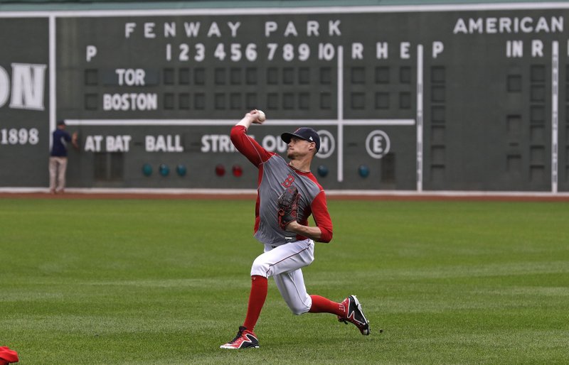 Boston Red Sox starting pitcher Clay Buchholz throws during a team baseball practice at Fenway Park in Boston, Saturday, Oct. 8, 2016. Buchholz will face Cleveland Indians starter Josh Tomlin in Game 3 of the American League Division Series. The Indians hold a 2-0 game lead in the series. 