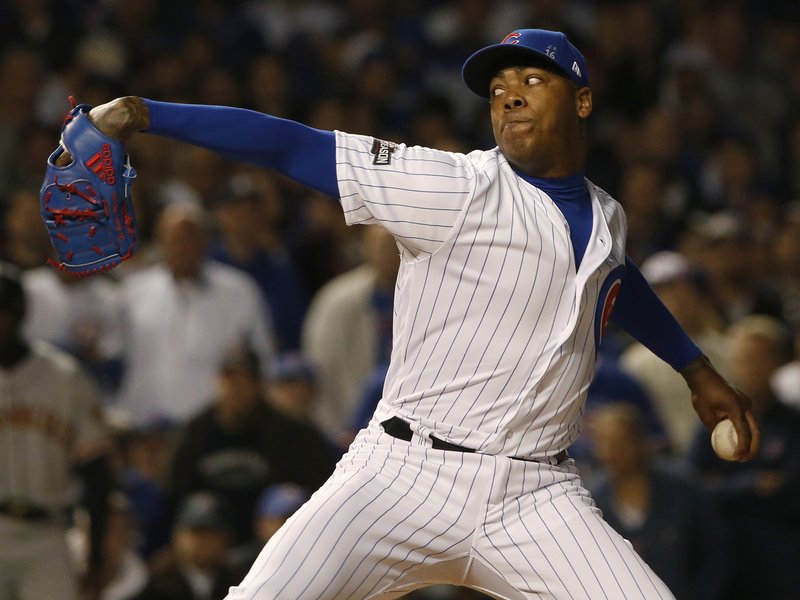 Chicago Cubs relief pitcher Aroldis Chapman (54) throws in the ninth inning of Game 2 of baseball's National League Division Series against the San Francisco Giants, Saturday, Oct. 8, 2016, in Chicago. (AP Photo/Nam Y. Huh)