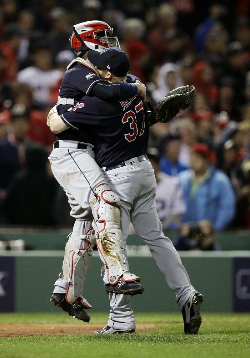 Cleveland catcher Roberto Perez (left) and relief pitcher Cody Allen react after the Indians advanced to the American League Championship Series for the first time since 2007 by beating Boston 4-3 on Monday to complete a 3-0 sweep in their American League division series.