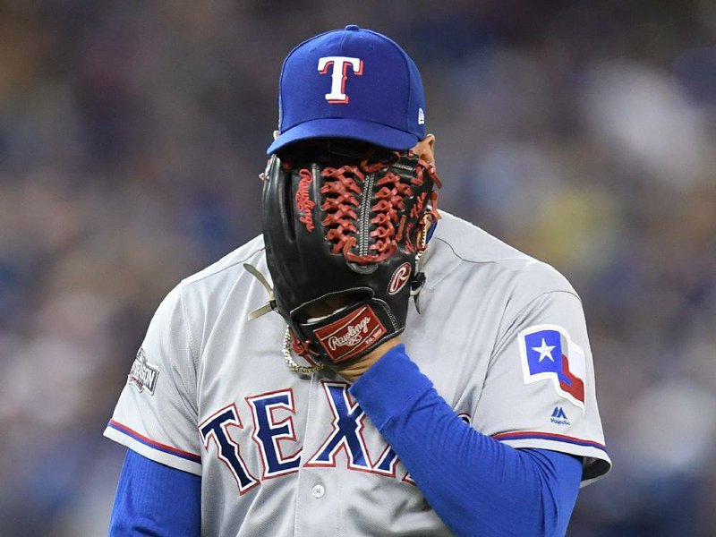 Texas Rangers reliever Keone Kela yells into his glove after giving up the game-tying run on a passed ball during the sixth inning of Game 3 of the American League Division Series against hte Toronto Blue Jays on Sunday in Toronto. The Rangers lost 7-6 in 10 innings and were elimiated from the playoffs. for the second consecutive season.