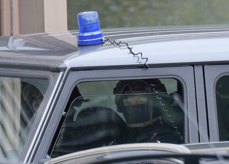 German special police forces secure the perimeter of the district court in Dresden on Monday, after 22-year-old Jaber Albakr was arrested in the eastern city of Leipzig at the end of a nearly two-day manhunt after explosives were found in his apartment Saturday.