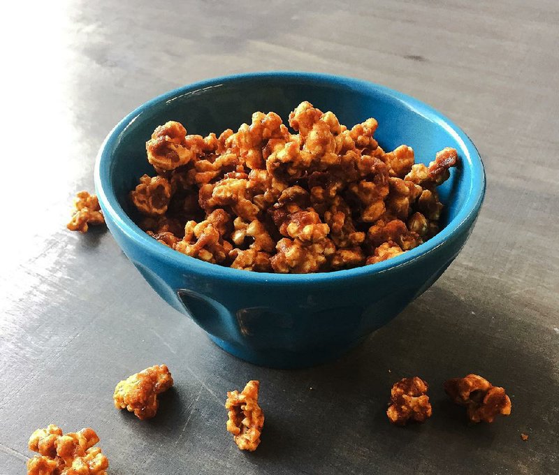 Caramel-Honey Popcorn can be spiced up with chipotle and cinnamon. 
