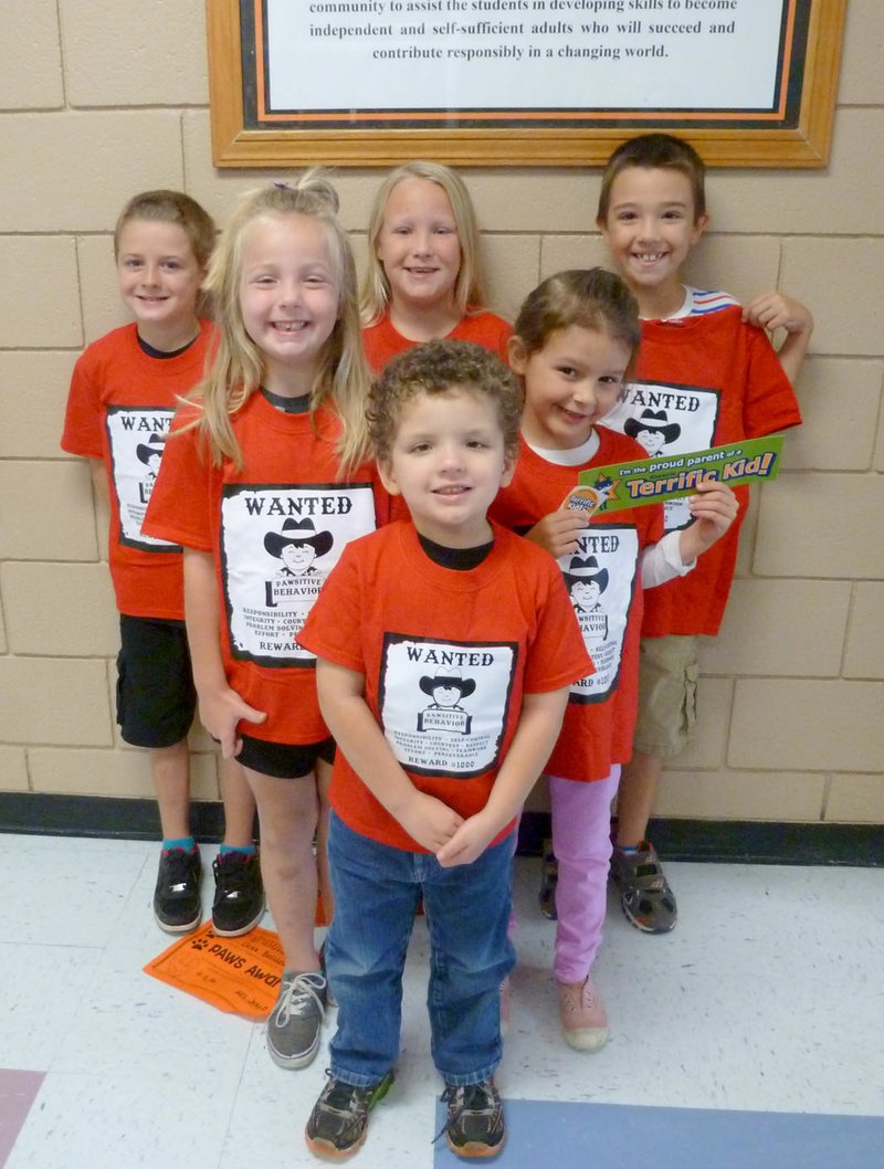 Submitted Photo PAWS (&#8220;Pawsitive&#8221; and Wise Students) Students of the Month for October were honored at last Monday&#8217;s Rise and Shine assembly at Glenn Duffy Elementary School. Award winners this month were chosen for displaying self-control. Pictured are Daxx Belland of Bella Vista (back row), Landyn Perrine of Gravette and Hayden Chapman of Sulphur Springs, Layla Patton of Gravette (middle row), Karabelle Fuqua of Bella Vista, and Bryan Maddox of Gravette (front).