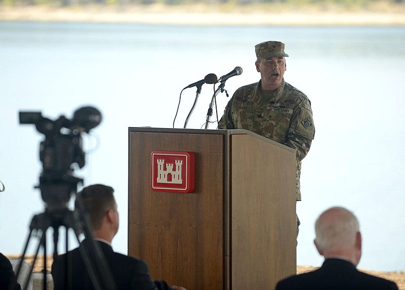 NWA Democrat-Gazette/BEN GOFF &#8226; @NWABENGOFF Col. Robert G. Dixon of the Army Corps of Engineers speaks Thursday during a ceremony marking the 50th anniversary of Beaver Lake and dam Eureka Springs.