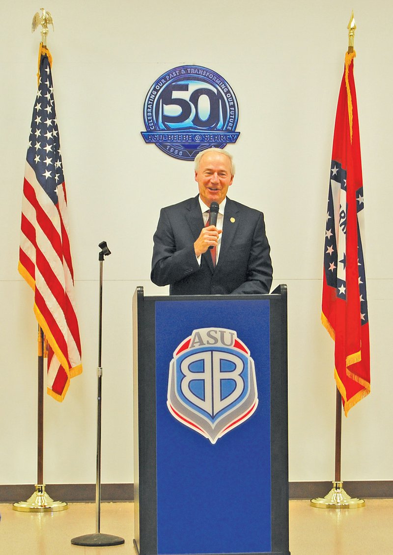 Gov. Asa Hutchinson provides the keynote address at the 50th anniversary of Arkansas State University-Beebe at Searcy on Oct. 6. Hutchinson said two-year colleges such as ASU-Beebe at Searcy provide an affordable way to receive workforce education.