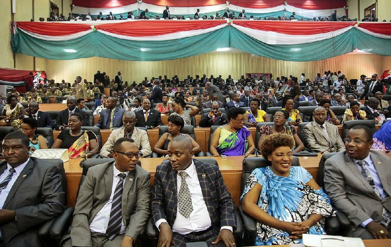 Members of Burundi’s Parliament gather in August 2015 for the swearing-in of President Pierre Nkurunziza, whose decision to seek a third term touched off more than a year of violence in the East African country. 