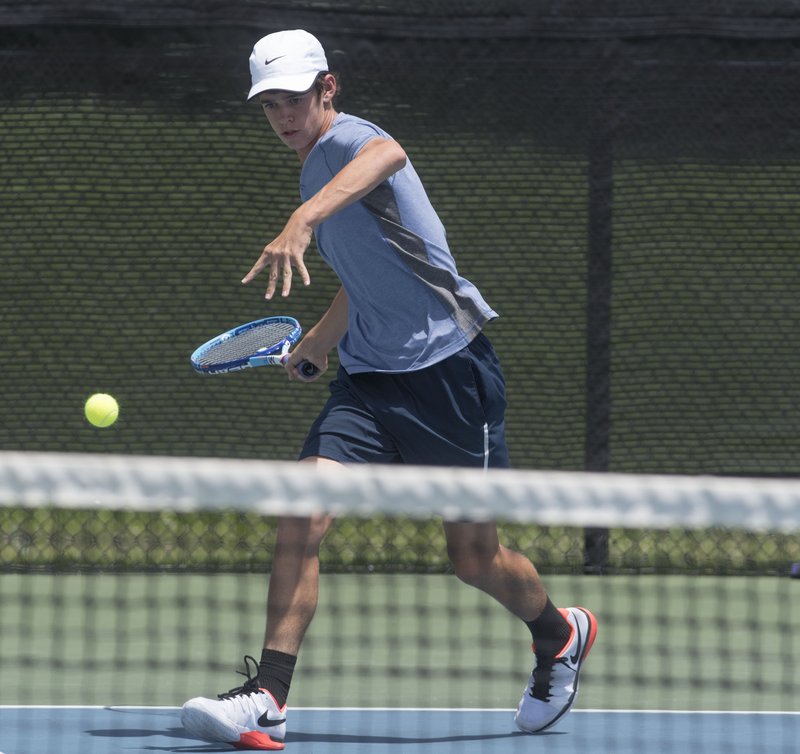 Hans Corbell of Fayetteville competes against Jacob Bridges of Little Rock on July 17 at the Serena Smith State Farm Junior Open state championships in Bentonville. Bridges beat Corbell, 6-2, 6-3, in straight sets.