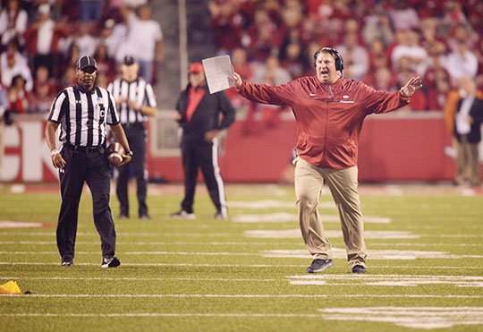 NWA Democrat-Gazette/Ben Goff BEGGING TO DIFFER: Arkansas coach Bret Bielema argues with the officials in the Razorbacks' game against Alabama, drawing a penalty for unsportsmanlike conduct after a penalty negated Austin Allen's touchdown pass to Drew Morgan in the second half of Alabama's 49-30 victory.