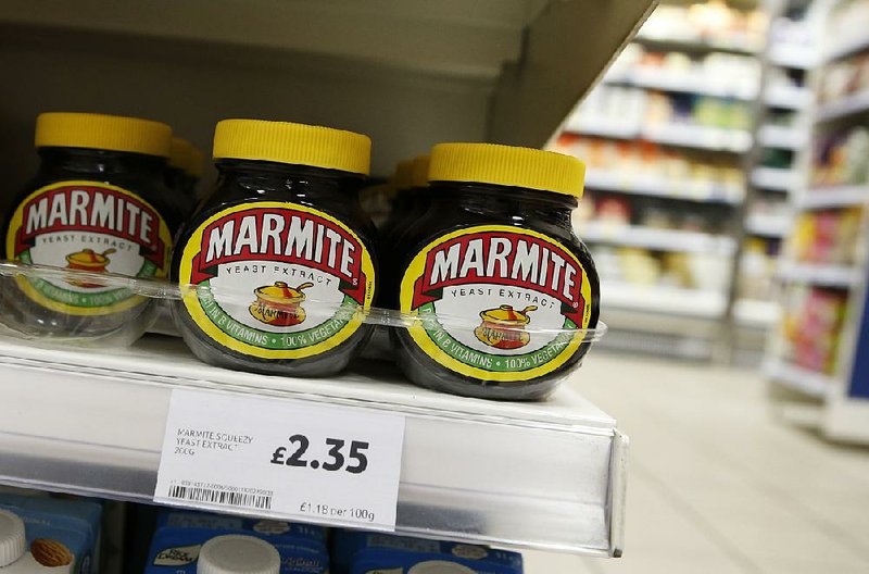 Jars of the popular U.K. food product Marmite, which is owned by the Anglo-Dutch multinational Unilever, were displayed for sale at a Tesco in central London on Thursday. Britain’s biggest supermarket chain, Tesco, has pulled cherished products such as Marmite spread and Ben & Jerry’s ice cream from its website amid a dispute with consumer goods giant Unilever. 