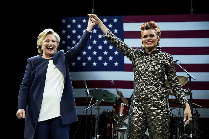 Hillary Clinton takes the stage Thursday after being introduced by singer Andra Day at a fundraiser at the Civic Center Auditorium in San Francisco.