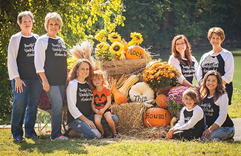 In the front row, from left, Jane Orr, Jan Haney, Staci McHenry and her daughter Jayden McHenry, Addy Allen and her mom, Clarissa Allen; and back row, Heather Chavis and Pat Evins are shown with Rock This House’s Pumpkin Dash decorations. The Pumpkin Dash will offer a 6K, 5K and 4K races that will take place Oct. 29 to raise money for Rock This House in Ash Flat, an annual women’s conference.