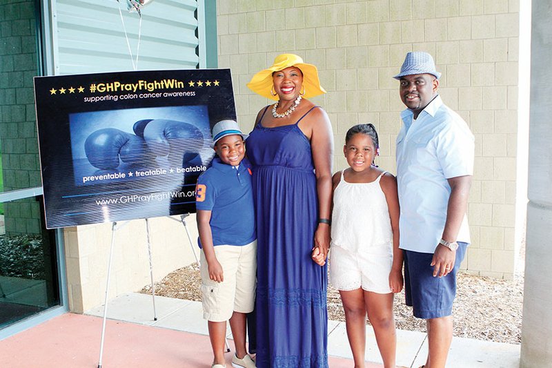 Greg Hunt of Conway, who died of cancer in November 2015, is pictured in July 2015 with his family — his wife, Kendra, and their children, Caleb and Hannah — at the Shorts, Sundresses and Sunhats event in his hometown of Lonoke. The silent auction was part of Greg’s campaign, #GHGoFightWin, to bring awareness to colon cancer, which is where his illness started. A golf tournament is scheduled for Friday in conjunction with the University of Central Arkansas’ homecoming to raise money for the Gregory E. Hunt Scholarship.