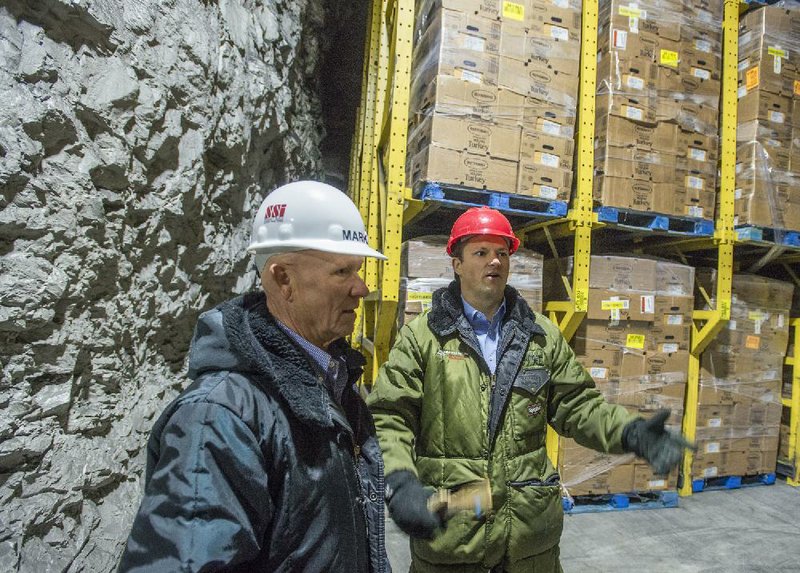 Mark Rumsey (left), chairman of the Zero Mountain Inc. board, and his son, Joe, the company’s CEO, are second- and third-generation leaders of the cold storage warehouse business. 