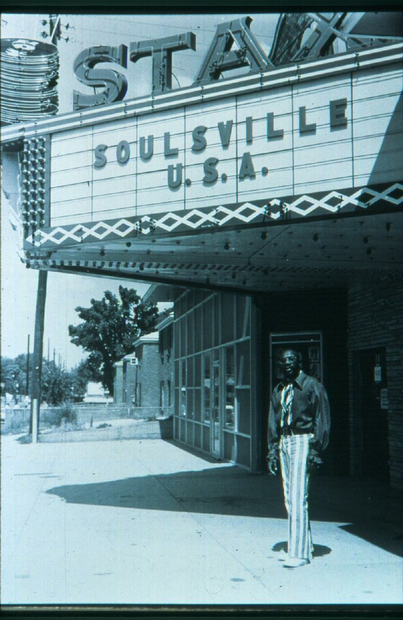 Singer Isaac Hayes stands under the marquee at the Stax Records studio in Memphis, circa 1960s. 