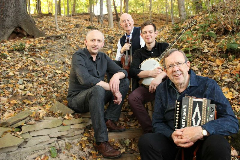 The Brock McGuire Band — (from left) Manus McGuire, Denis Casey, Dave Curley and Paul Brock — perform Monday at the University of Arkansas at Little Rock.
