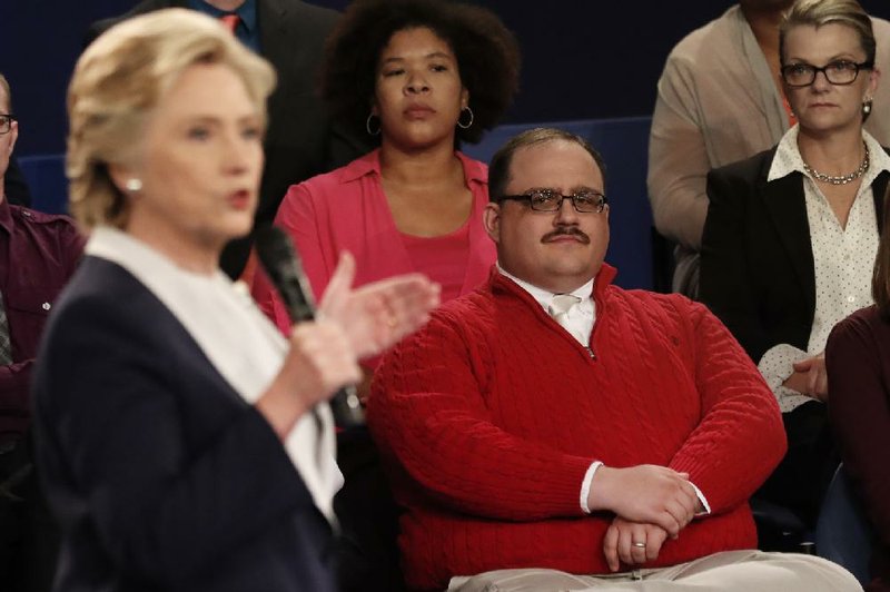 Sweater-wearer Kenneth Bone made a warm, fuzzy impression at the second presidential debate in St. Louis last Sunday. 