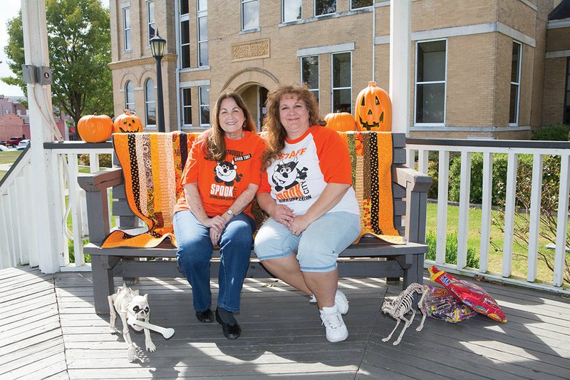 Wanda Posey, left, and Joyce Robinson, co-chairwomen of Spook City in downtown Benton, are preparing for the one-night event to take place Saturday that draws in 5,000 to 8,000 people and requires thousands of dollars worth of candy for trick-or-treaters.
