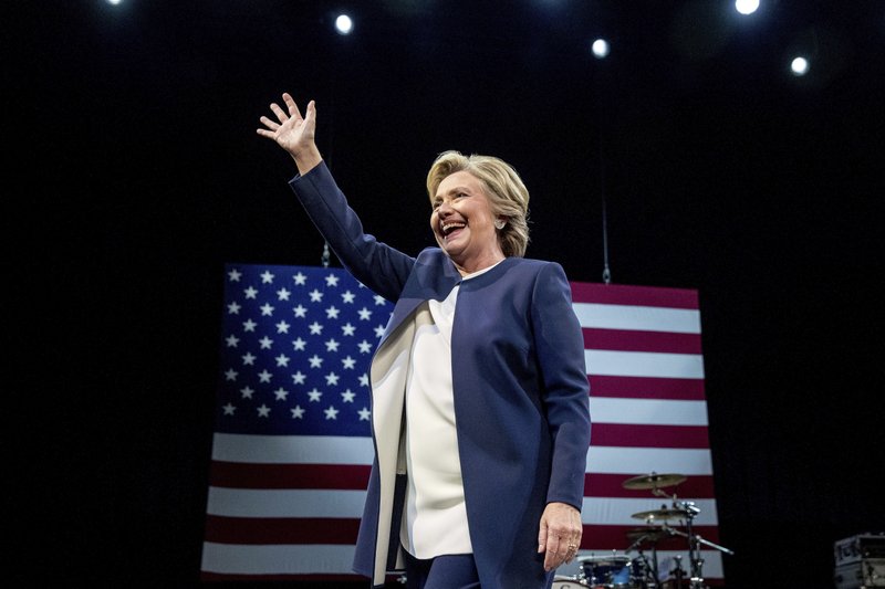 Democratic presidential candidate Hillary Clinton waves after speaking at a fundraiser at the Civic Center Auditorium in San Francisco, Thursday, Oct. 13, 2016. 