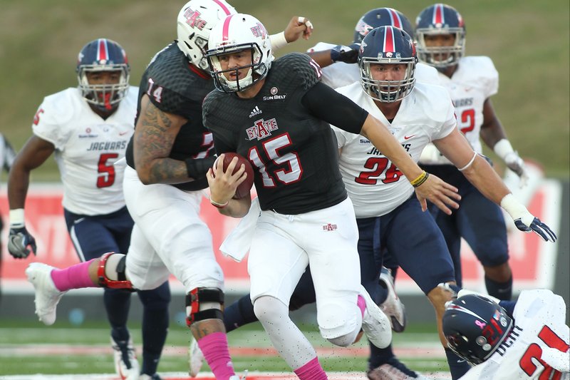 ASU quarterback Justice Hansen runs the ball during the team's 17-7 win over South Alabama on Saturday, Oct. 15, 2016.