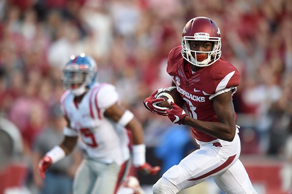 Arkansas receiver Dominique Reed scores a touchdown during a game against Ole Miss on Saturday, Oct. 15, 2016, in Fayetteville. 