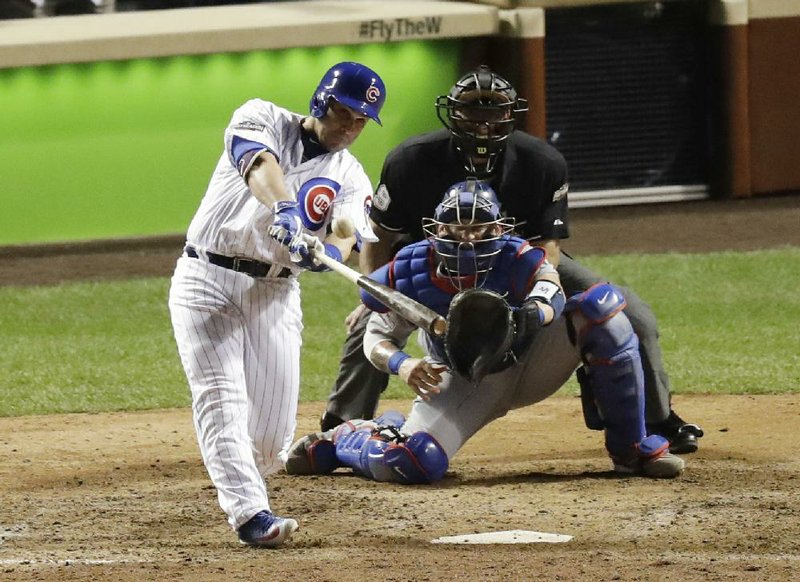 Chicago pinch hitter Miguel Montero hit a grand slam in the bottom of the eighth inning to break a 3-3 tie and push the Cubs to an 8-4 victory in Game 1 of the National League Championship Series on Saturday.