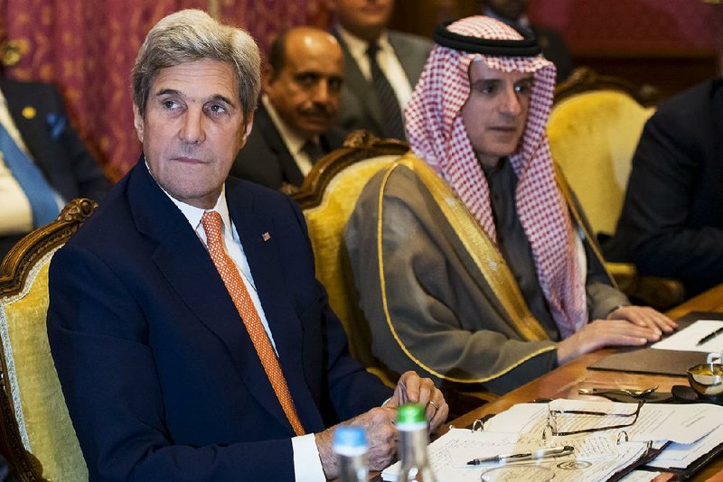 U.S. Secretary of State John Kerry and Saudi Arabia’s Foreign Minister Adel al-Jubeir attend Saturday’s meeting in Lausanne, Switzerland, where they discussed the crisis in Syria. 