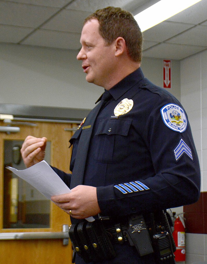 Janelle Jessen/Herald-Leader Chris Salley, sergeant over the school resource officer program, gave a report about his department to school board members on Thursday night.