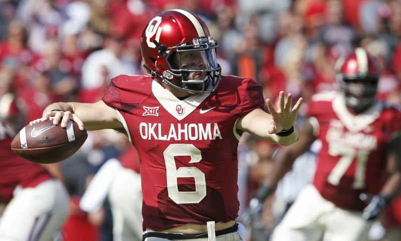 Oklahoma quarterback Baker Mayfield (6) throws in the second quarter of an NCAA college football game against Kansas State in Norman, Okla., Saturday, Oct. 15, 2016. (AP Photo/Sue Ogrocki)