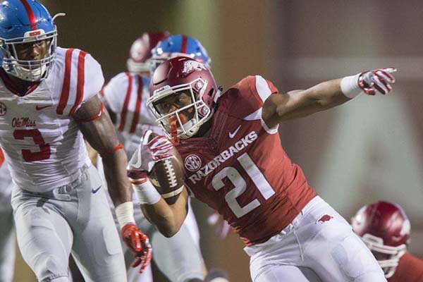 Arkansas running back Devwah Whaley runs the ball during a game against Ole Miss on Saturday, Oct. 15, 2016, in Fayetteville. 