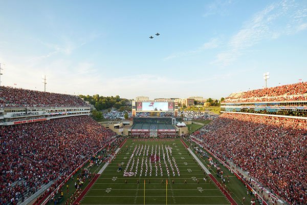 Fighter jets fly over Donald W. Reynolds Razorback Stadium prior to a game between Arkansas and Ole Miss on Saturday, Oct. 15, 2016, in Fayetteville. 