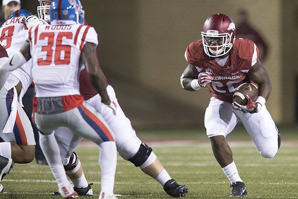 Arkansas running back Rawleigh Williams carries the ball during a game against Ole Miss on Saturday, Oct. 15, 2016, in Fayetteville. 