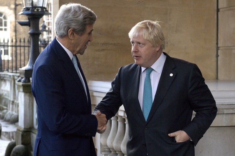 US Secretary of State John Kerry, left, is greeted by British Foreign Secretary Boris Johnson ahead of a meeting on the situation in Syria, at Lancaster House in London, Sunday Oct. 16, 2016. Renewed international efforts to solve the conflict in Syria, heightened by the plight of people in the city of Aleppo, have made little progress but more talks are planned. 