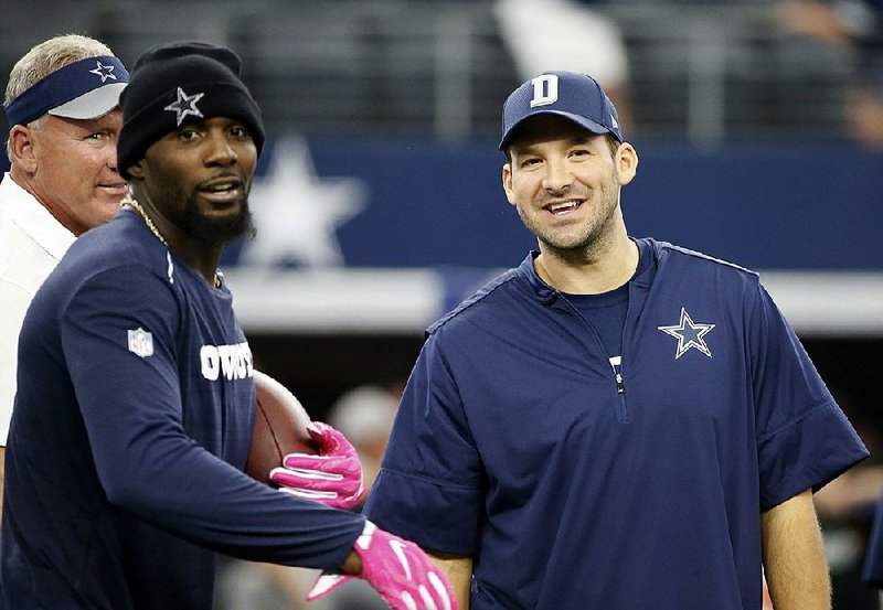Dallas wide receiver Dez Bryant (left) is scheduled to be back in the lineup when the Cowboys host Philadelphia on Oct. 30, but the return date of quarterback Tony Romo is still unclear.