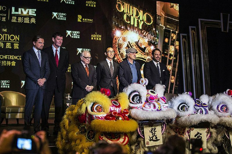 Actor Leonardo DiCaprio (from left), Australian billionaire James Packer, director Martin Scorsese, billionaire Lawrence Ho, actor Robert De Niro and filmmaker Brett Ratner stand for photographs during a 2015 news conference at Melco Crown Entertainment’s Studio City casino resort in Macau, China. Packer said Tuesday that he is “deeply concerned” for Crown Resorts Ltd. employees being detained in China. 