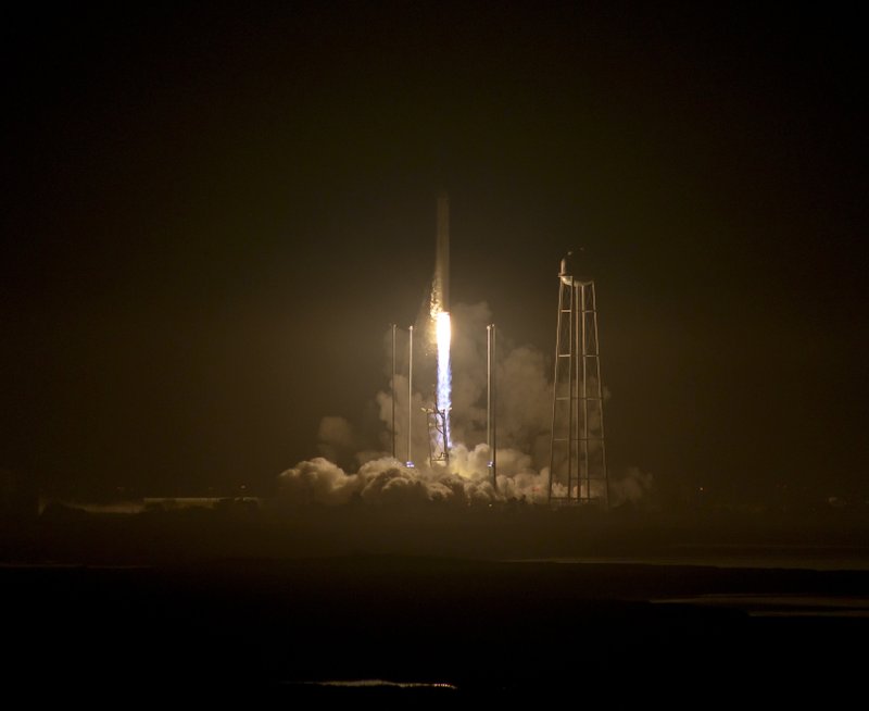 The Orbital ATK Antares rocket, with the Cygnus spacecraft onboard, launches from Pad-0A, Monday, Oct. 17, 2016 at NASA's Wallops Flight Facility in Wallops Island, Va.  
