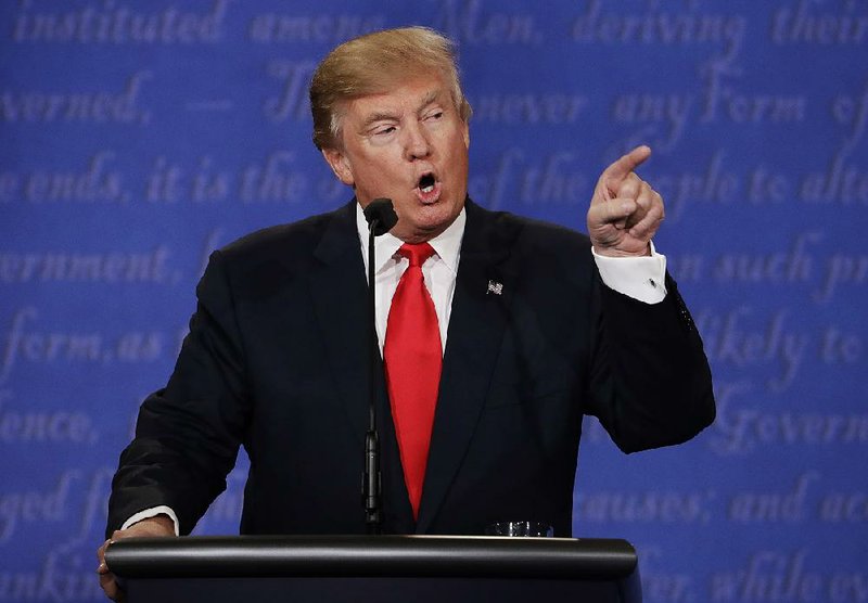 Donald Trump (shown) and Hillary Clinton clashed repeatedly Wednesday night in their debate in Las Vegas. Trump refused to say whether he will accept the results of the election if Clinton is the winner. “I will tell you at the time,” he said. “I’ll keep you in suspense.”