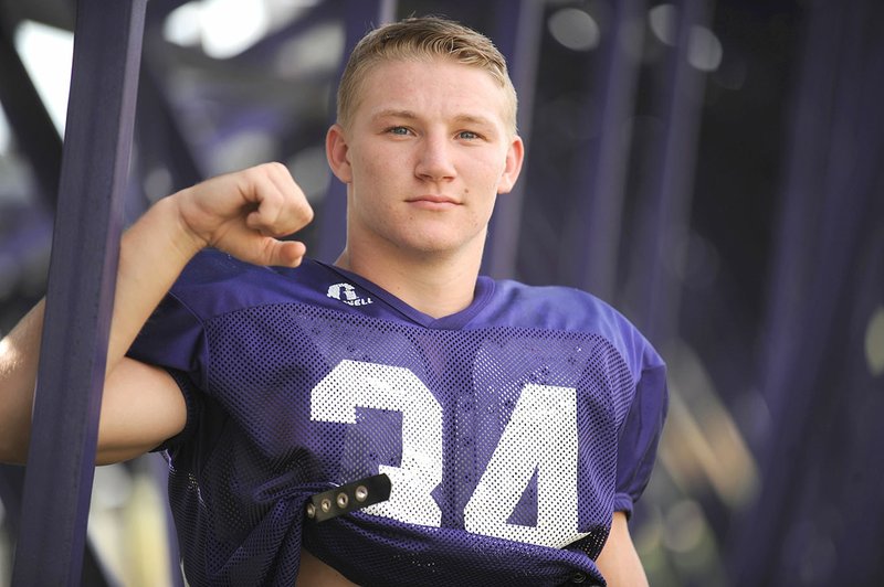 Elkins senior quarterback Jake Strode poses Wednesday in Elkins.