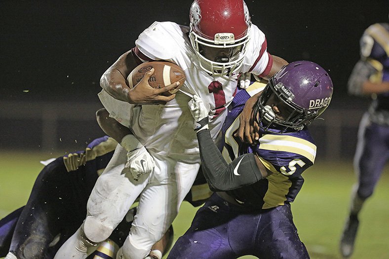 Michael Orrell/News-Times Junction City's Hishmma Taylor gets ready to make a tackle during the Dragons' home victory over Lake Village last week. Tonight, Junction City travels to Smackover for a showdown between Union County rivals.