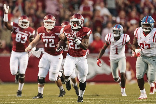 Arkansas running back Rawleigh Williams III (22) carries for a gain during the first quarter of an NCAA football game against Mississippi on Saturday, Oct. 15, 2016, in Fayetteville, Ark. (AP Photo/Chris Brashers)

