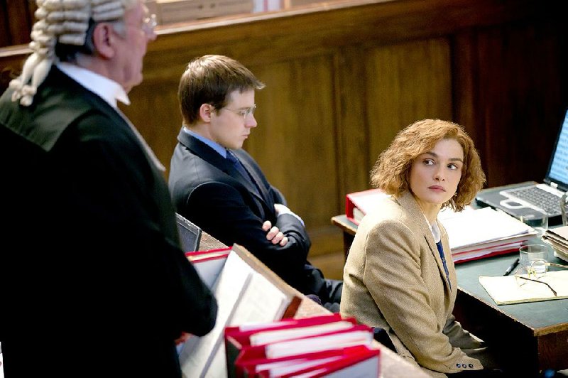 Bewigged barrister Richard Rampton (Tom Wilkinson) argues while solicitor Anthony Julius (Andrew Scott) and their client, writer and historian Deborah Lipstadt (Rachel Weisz), look on in Mick Jackson’s fact-based drama Denial, about a Holocaust denier’s day in court.