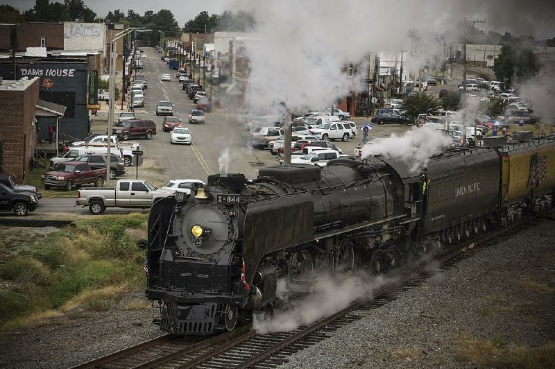 Union Pacific No. 844, the last steam locomotive built for the railroad, departs Paragould on Thursday as it makes its way to West Memphis for Saturday’s dedication and opening of a bike and pedestrian path on the Harahan Bridge.