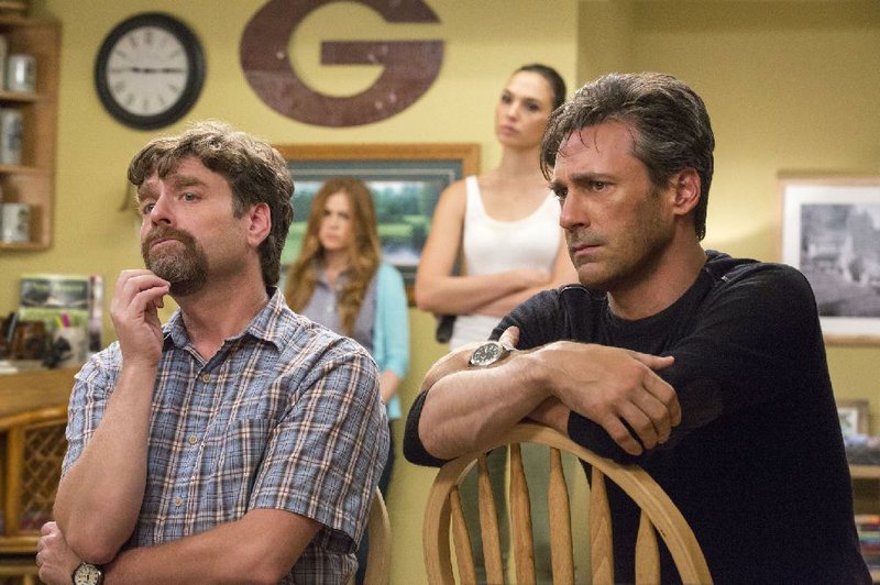 Jeff (Zach Galifianakis) has suspicions about his new neighbors in Greg Mottola’s comedy Keeping Up With the Joneses.