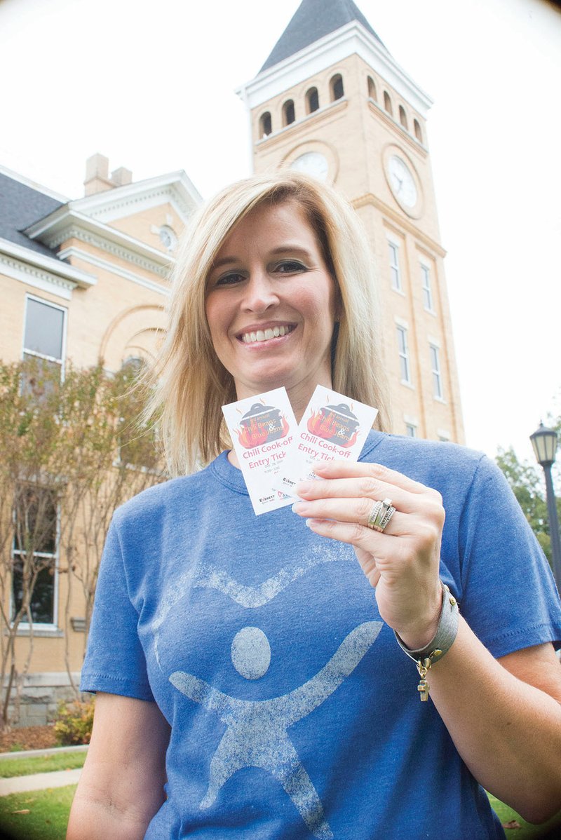 Jennifer Harklau, executive director of the Saline County Court Appointed Special Advocates, holds tickets to the hottest cook-off event in Benton. The third annual Chili Beans and Blue Jeans cook-off will take place Friday at Northside Church of Christ, with all proceeds benefiting the child-advocacy organization.