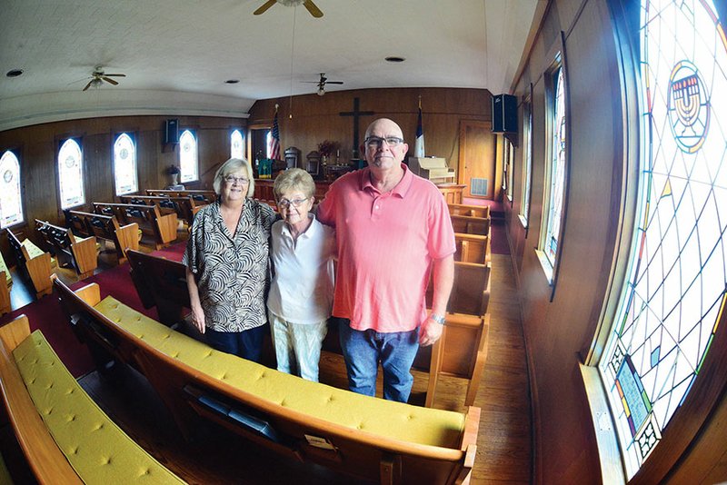 Rockport United Methodist Church will celebrate its 200th anniversary today. Kay Donihue, left, and Olivia Pierce, longtime members of the church, and the Rev. Troy Cate have been planning the celebration for several months. Worship services will begin at 10:30 a.m., followed by lunch at noon. The public is invited.