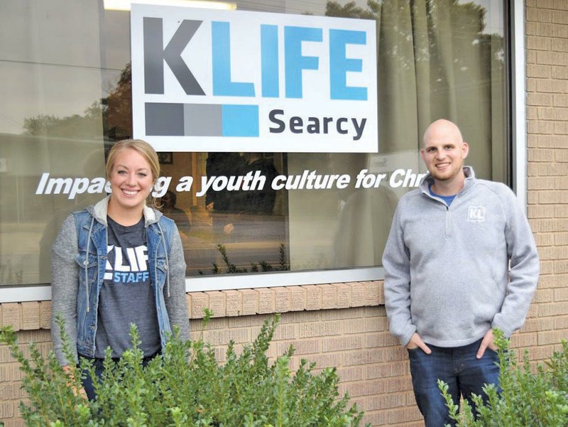 Katelyn Tolle and Matt Berry, new directors at Searcy KLIFE, stand outside of the chapter’s headquarters in Searcy. KLIFE is a youth ministry that guides college students through leading small groups of children in grades five through 12.