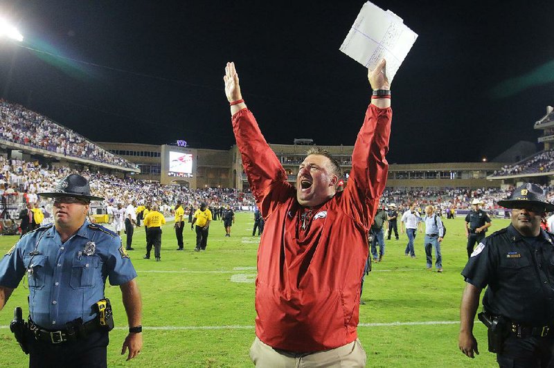 9/10/16
Arkansas Democrat-Gazette/STEPHEN B. THORNTON
Arkansas' coach Bret Bielema celebrates their OT victory over TCU Saturday September 10, 2016 at Amon G. Carter Stadium in Ft. Worth.