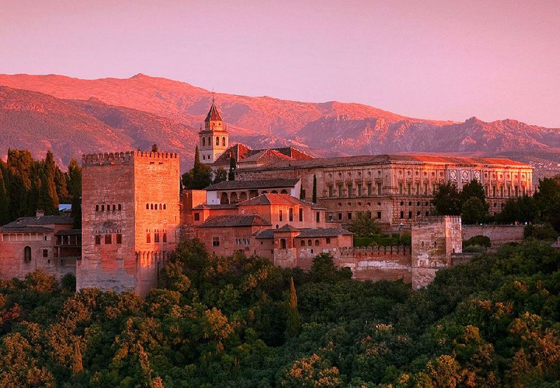 Granada’s exotically tangled Moorish quarter offers a fine viewpoint for watching the sun set over the Alhambra, which seems to glow with its own light. 